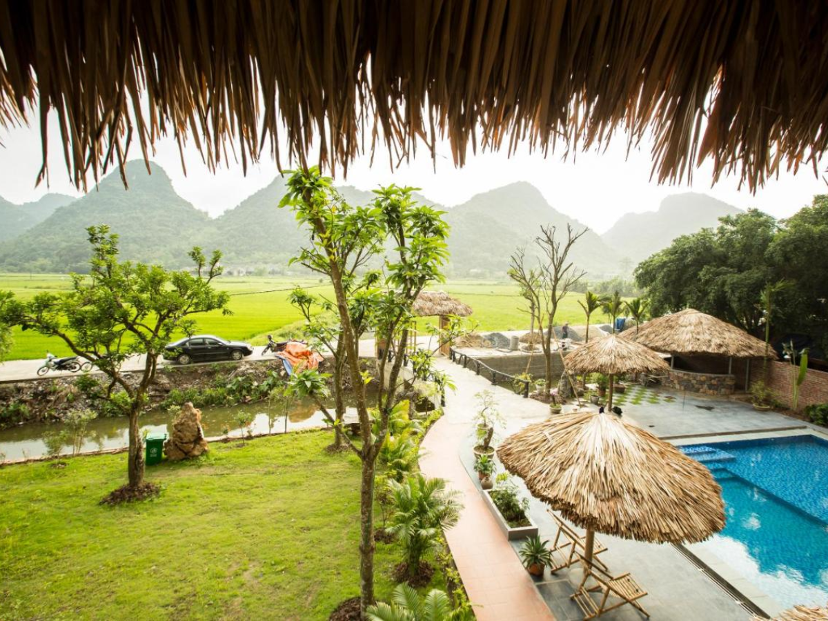 Resort hướng thẳng ra cánh đồng lúa xanh mướt. (Nguồn: Sưu tầm)